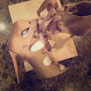 Brand new never worn size 8.5 ribbon heels